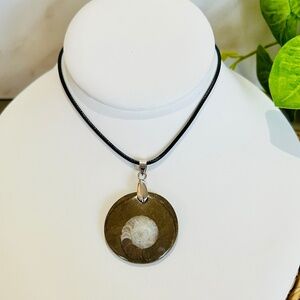Polished Fossil Disc Pendant on Leather Cord Necklace.
